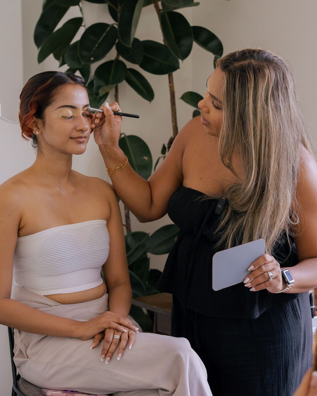 Close-up of eye makeup application during the demonstration